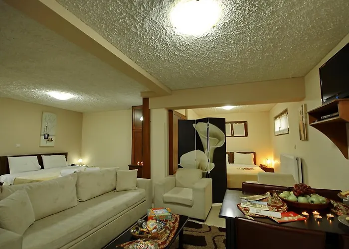 Ξενοδοχείο με διαμερίσματα Menalia Villas&suites κτημα κουμπουρη